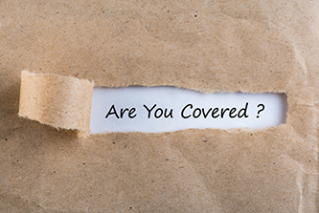 ARE YOU COVERED? Question message appearing behind ripped brown paper. Are you insured for your car, travel, home, health or other liability
