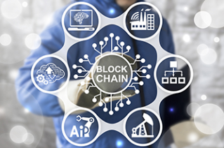 Blockchain Industrial Strategy Concept. Block Chain Industry 4.0 Technology. Worker touched blockchain microchip (circuit) icon on virtual screen. IT structure integration in manufacture.