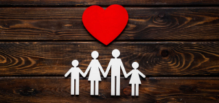 Family wooden figure and heart shape. Life insurance concept