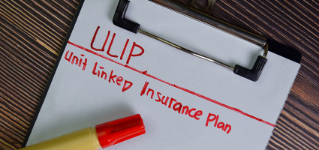 ULIP - Unit Linked Insuranced Plan write on a paperwork isolated on Wooden Table.